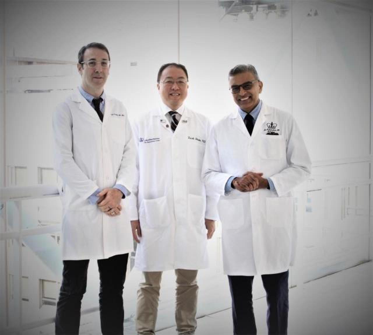 Daichi Shimbo, MD, Ian M. Kronish, MD, and Jai Radhakrishnan, MD, Hypertension Center Co-Directors in white coats standing side by side