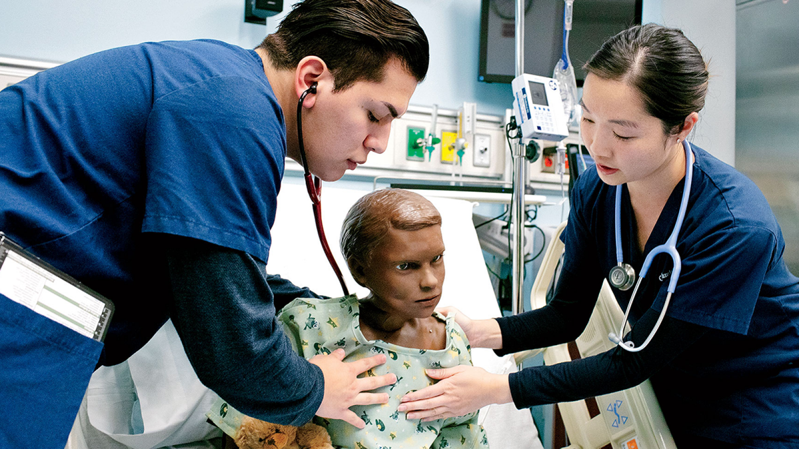 Columbia Nursing students with robot simulated patient