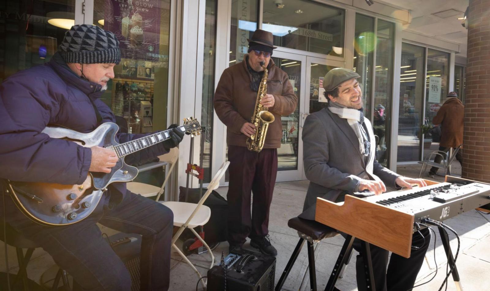 jazz trio playing outdoors at fall festival