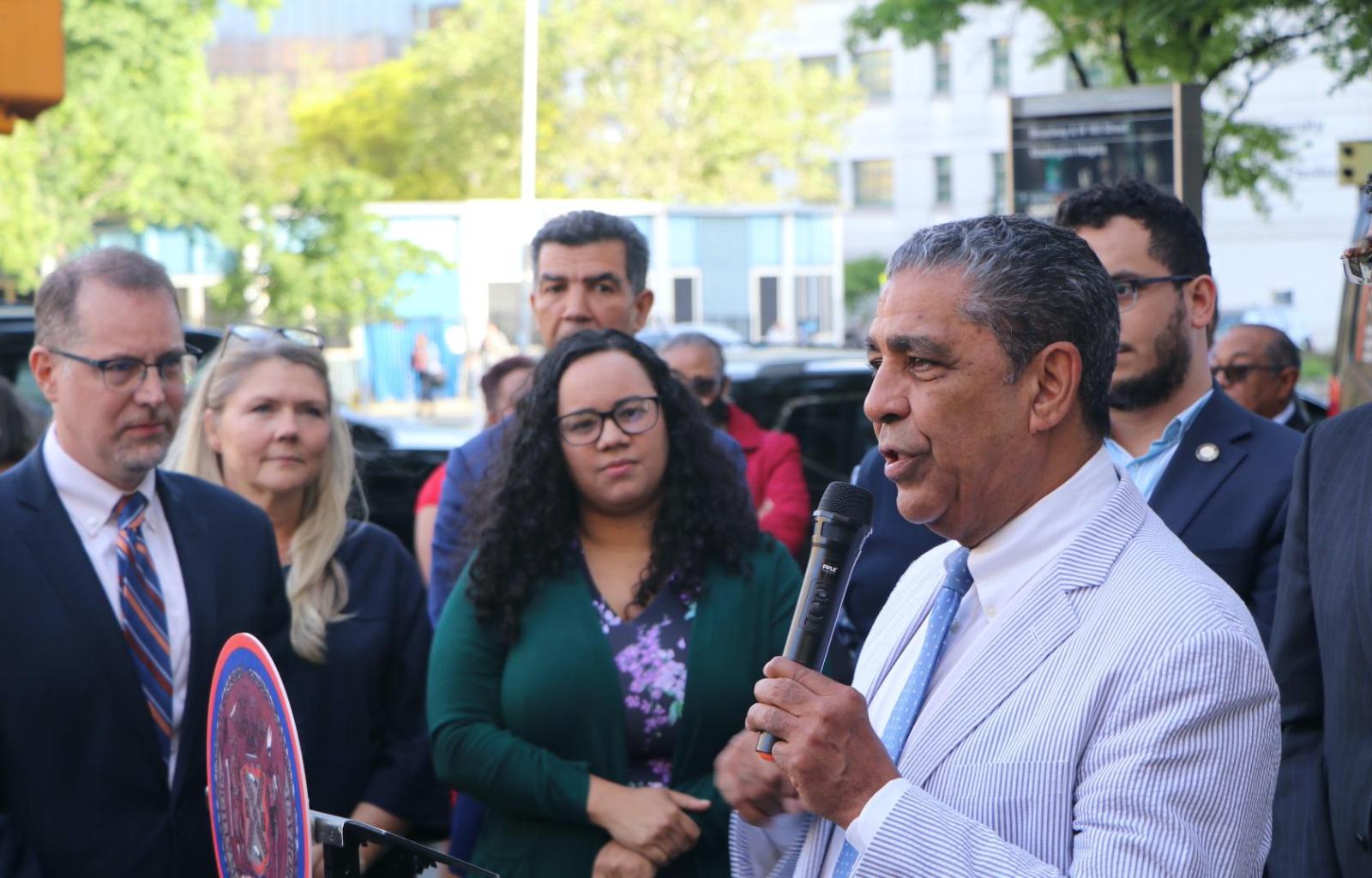 U.S. Representative Adriano Espaillat speaks to a crowd