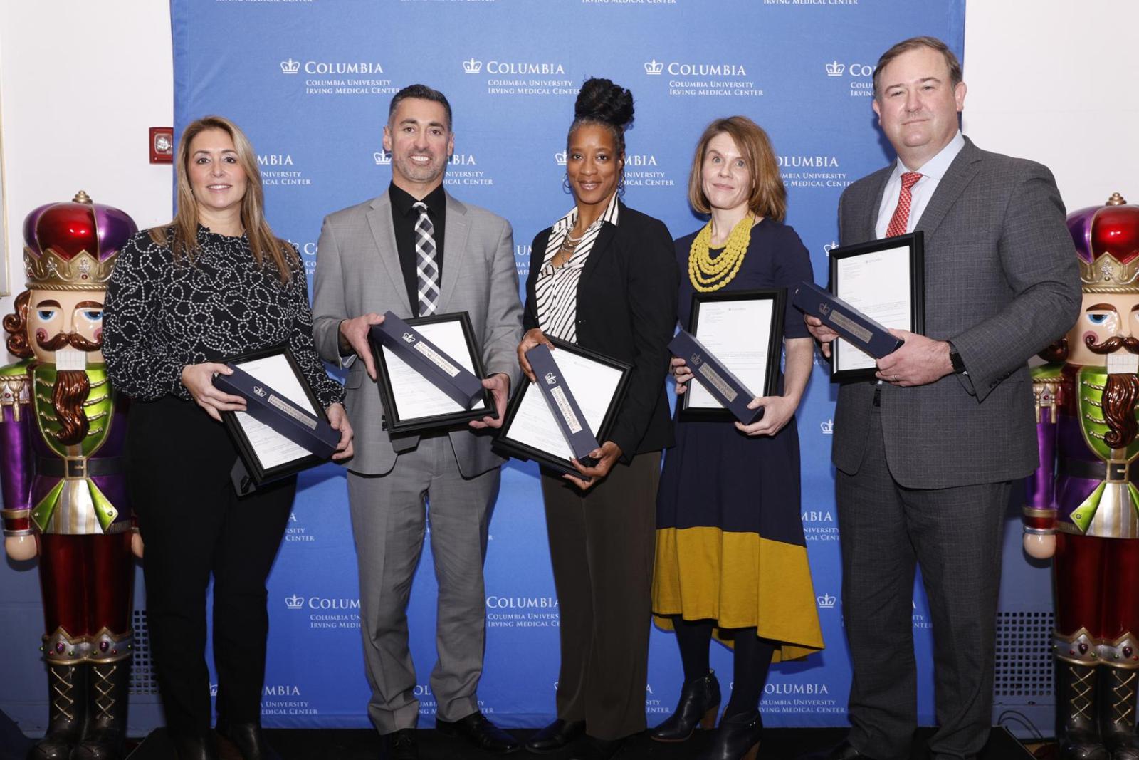 2022 Baton Award winners. From left: Stephanie Blaney, Christopher Cariello, Kelli Johnson, Kate Polson, and David DeClercq. Not pictured: Jessica Burns.