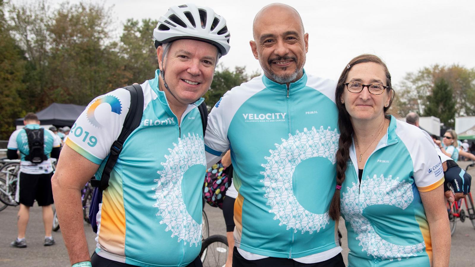 Three Velocity bicycle riders