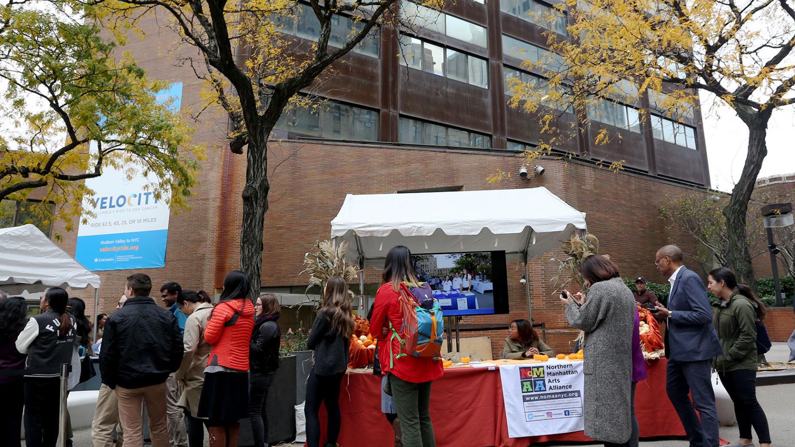 Welcome Haven attendees stopped by the informational tent for the Northern Manhattan Arts Alliance.