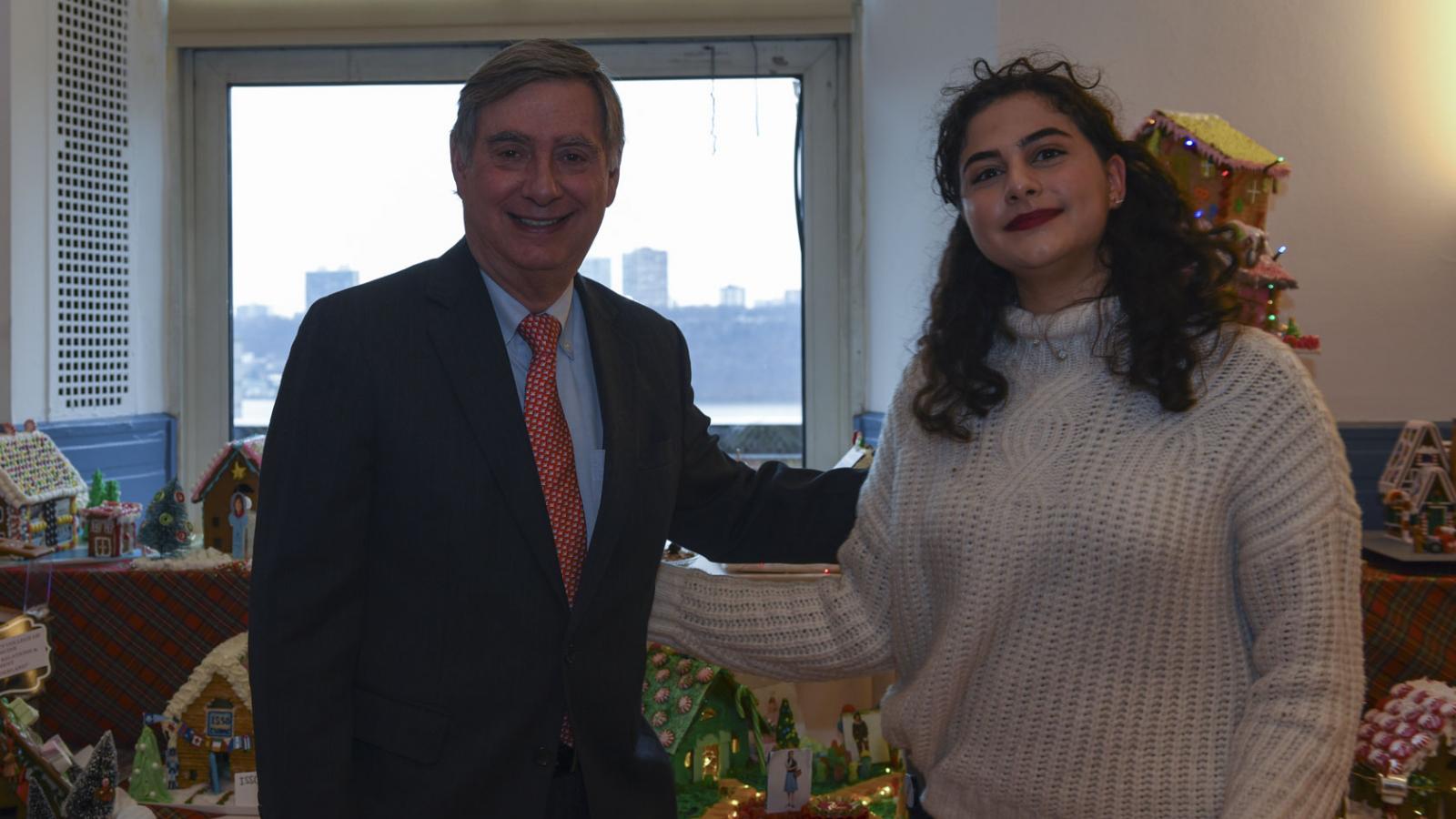 Dean Goldman is pictured with a member of the ColumbiaDoctors - CMIO and Intentional Redesign team, which won 2nd Place in a gingerbread house-making contest.