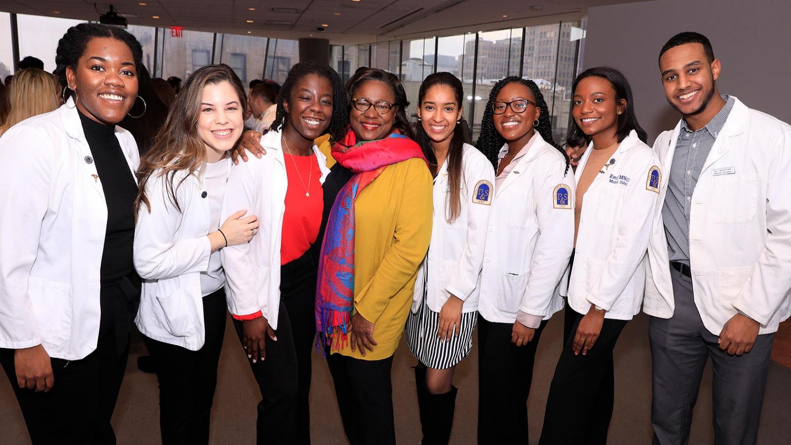 Members of the VP&S Class of 2022 are pictured with Dr. Hilda Hutcherson (center, wearing yellow).