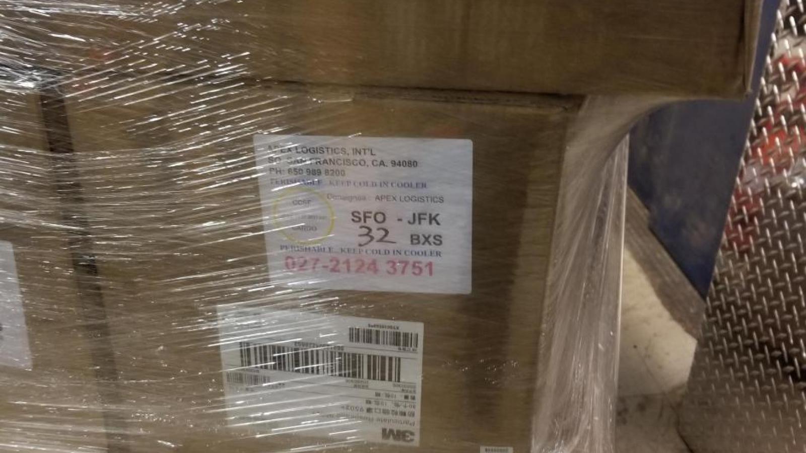 Boxes labelled 3M with shrink wrap