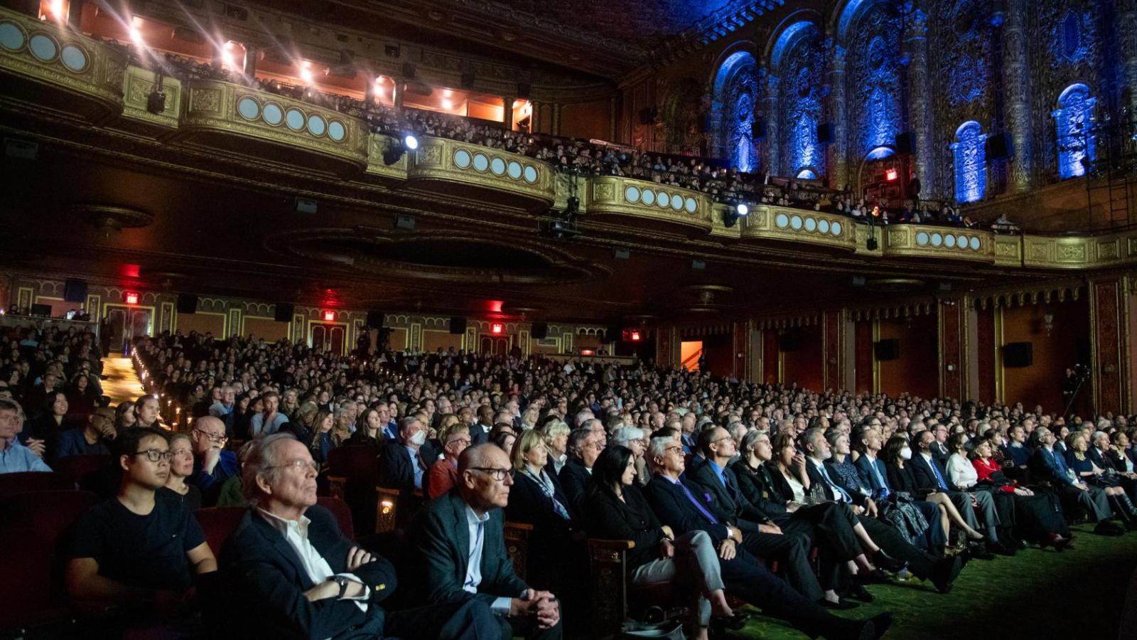 crowd seated in a theater