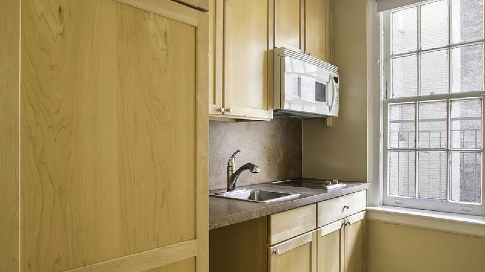View of a sample kitchenette in the Georgian Residence.