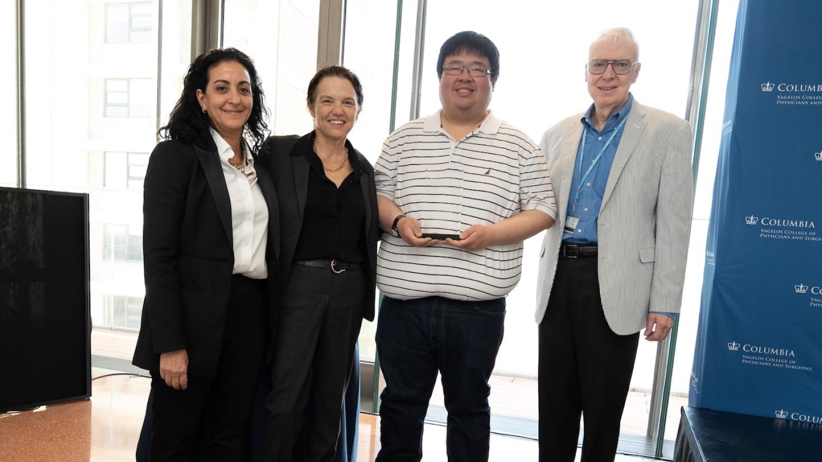 hooven award winner with colleagues