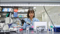 scientist working at a lab bench
