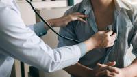 Getty Images photo of doctor listening to patient's heart with stethoscope