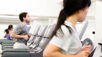 people exercising on treadmills