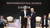 Michel Sadelain receiving Tang Award on ceremony stage