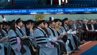 graduating dental students in their academic robes