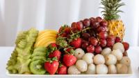 A platter of fresh cut fruit