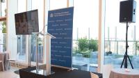 Glass podium and audiovisual set-up