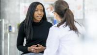 woman speaking with her doctor