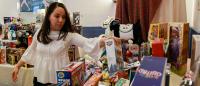A Columbia employee donates toys for the holidays.