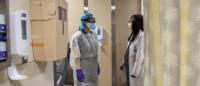 two physicians in PPE