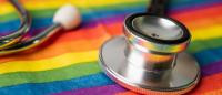 stethoscope on rainbow-colored cloth