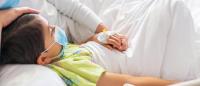 young child in hospital bed