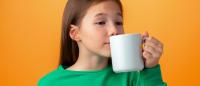 child drinking coffee