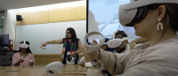 students wearing VR headsets in a classroom