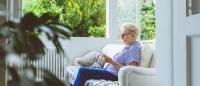 senior woman sitting on a sofa