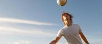 soccer player heading the ball