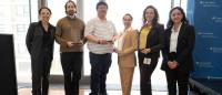 four winners of Hooven awards holding their awards