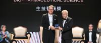 Michel Sadelain receiving Tang Award on ceremony stage