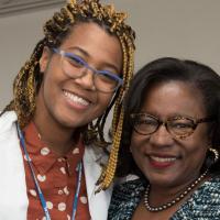 A Columbia medical student poses with Hilda Hutcherson, MD, senior associate dean for diversity and multicultural affairs at the Vagelos College of Physicians and Surgeons.